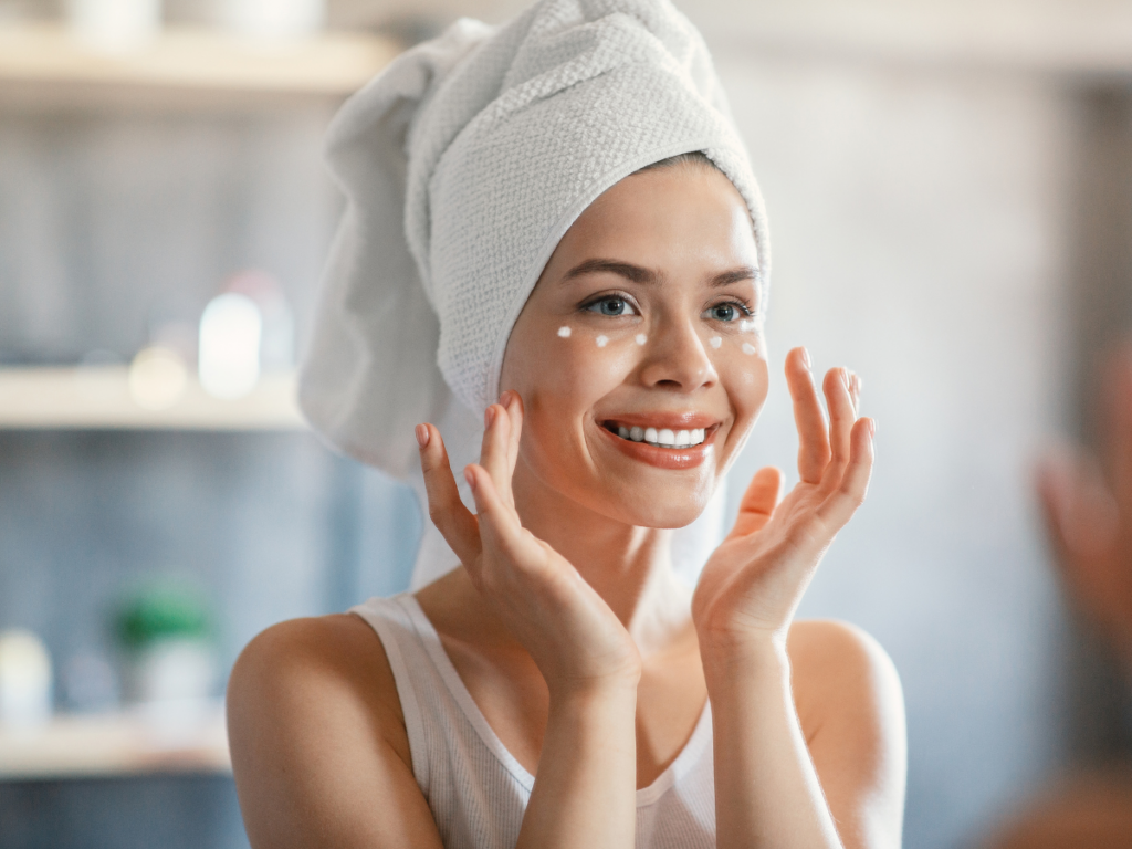 A picture of a woman applying eye cream. Skincare essentials: Eye Cream